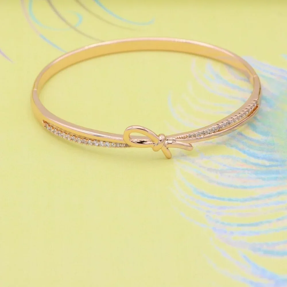 Rose Gold Bow Knot Bangle with Sparkling CZ Accents, XPBL0427